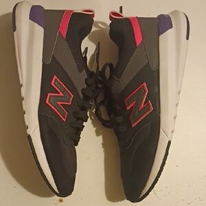New Balance Black Sneakers with Pink and Purple Accents